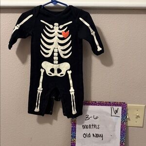 Old Navy Black Skeleton Romper with Red Heart